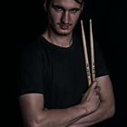 Portrait with drumsticks