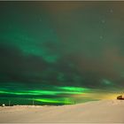 Powerful Aurora behind the clouds