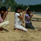 Prayer and offering on the beach Mae Nam