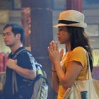 Praying in Man Mo Temple