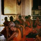 Praying monks in a monastery…