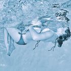 Pregnant women underwater model