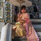 Presented in Thai costume