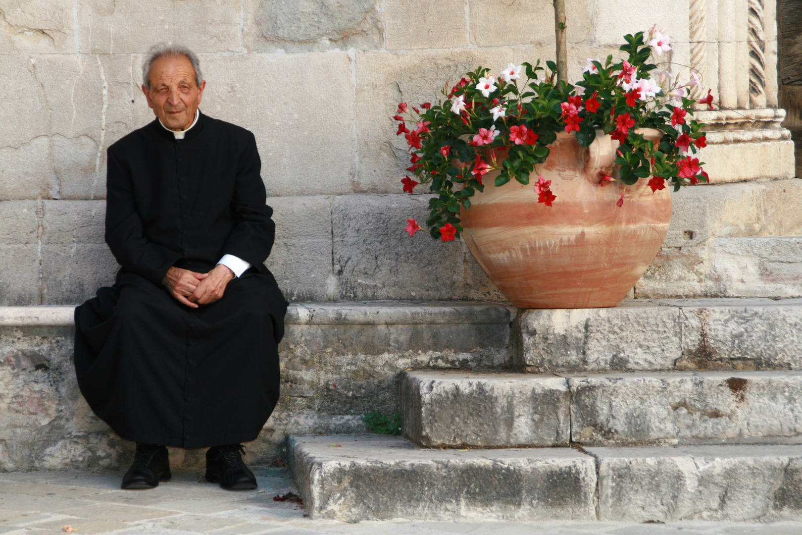 Priest in Visso, Italy