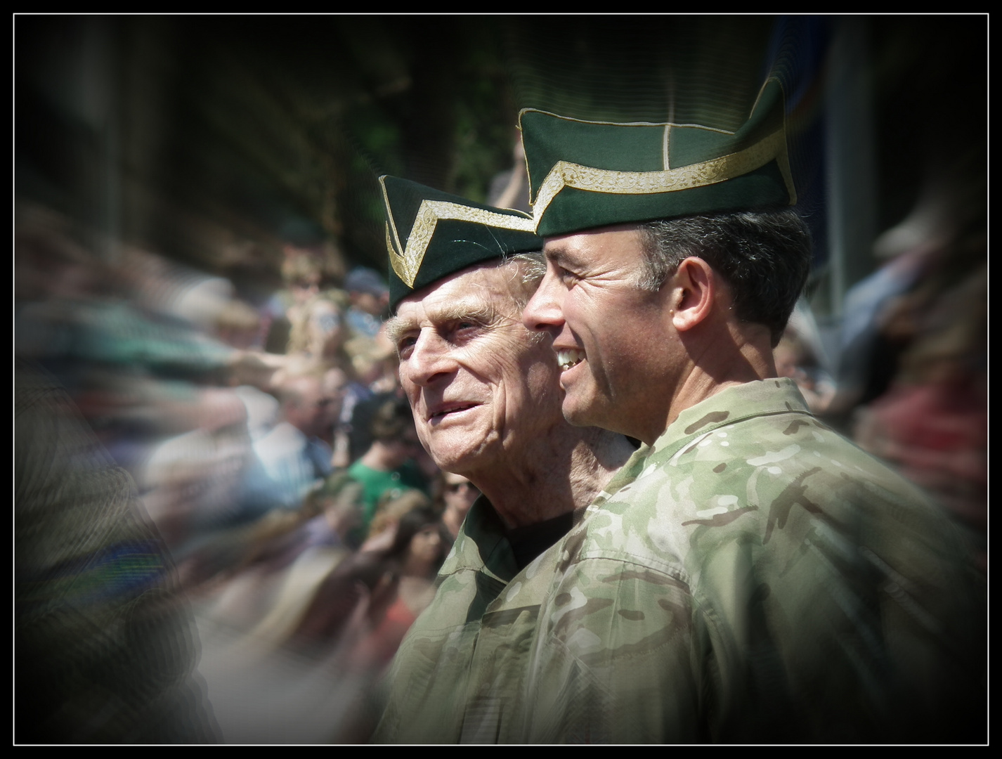 Prince Philip presenting war medals to British troops.