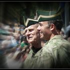 Prince Philip presenting war medals to British troops.