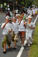 Procession on the highway in Denpasar