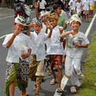 Procession on the highway in Denpasar