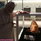 Prof. Dr. Norman Khalaf standing in front of Comoran Coelacanth in Kuwait 