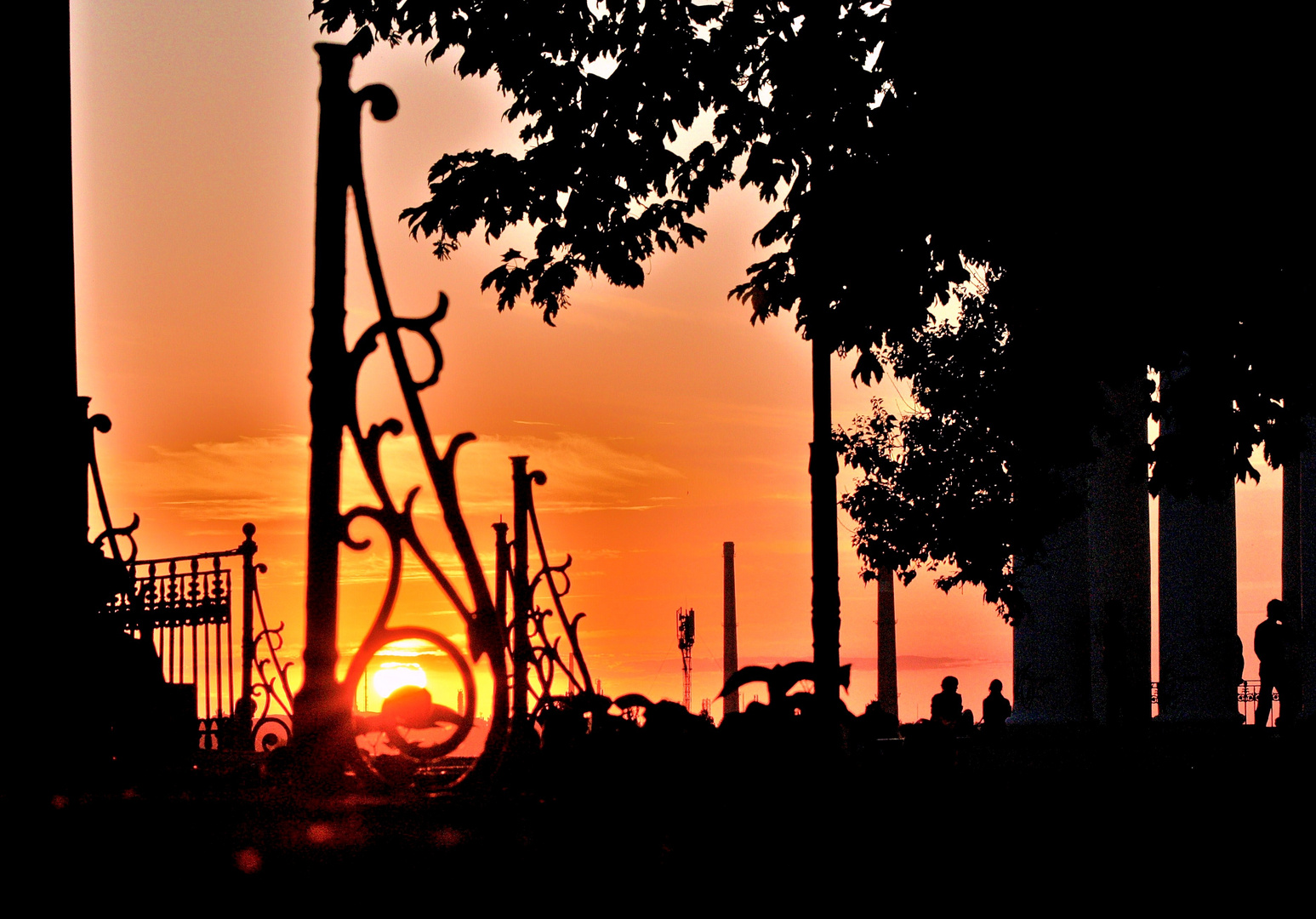 Public place in Odessa with the light of sunset)