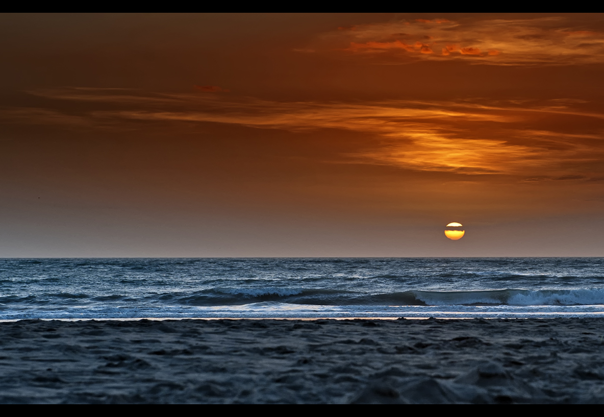 Puesta de sol en la Caleta de Cádiz