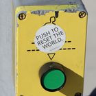 Push to reset the world