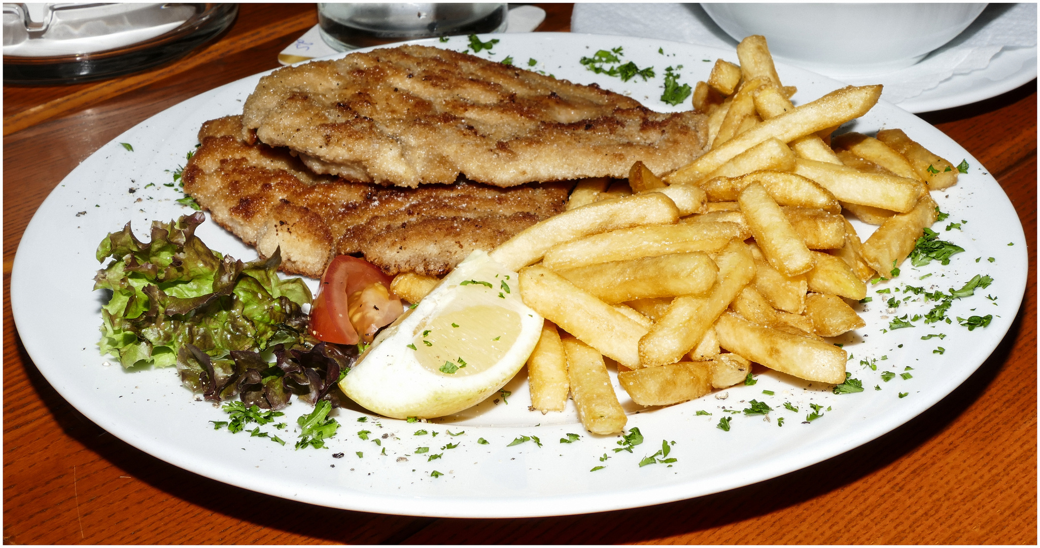 Putenschnitzel paniert