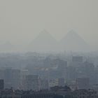 Pyramids behind the city