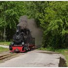 Qualmend über einen Bahnübergang