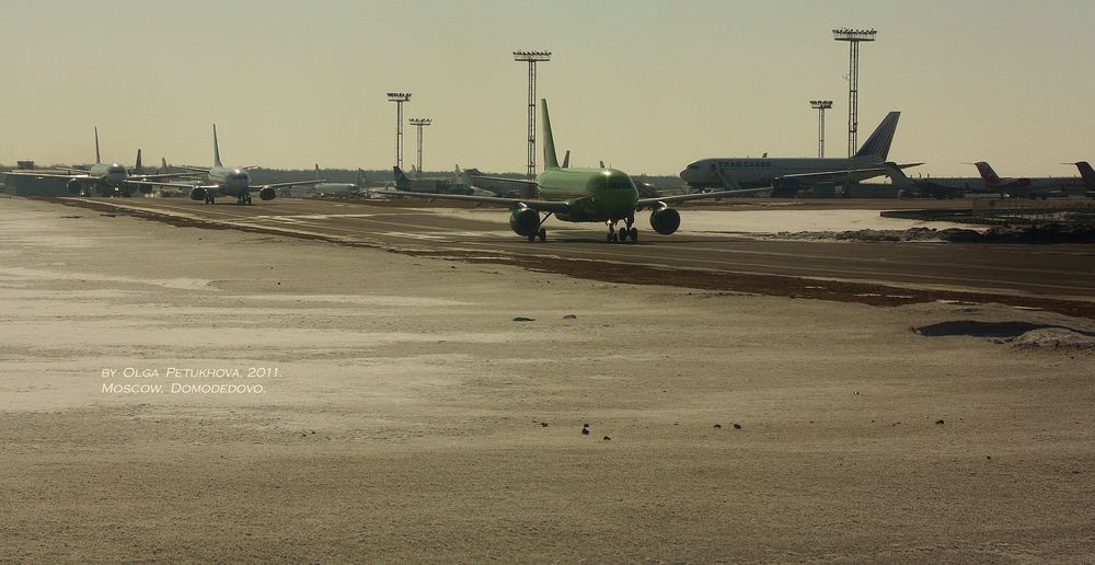 Queue of aircrafts waiting for take-off