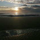 Raccogliendo pezzi di cielo sulla spiaggia