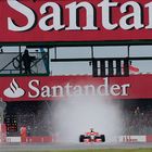 Race leader Hamilton on the long start & finish straight with a cloud of spray behind him