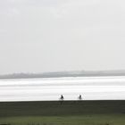 Radfahrer am Strand