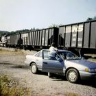 Railfan watching a Norfolk & Southern Coal Train at Montgomery Tunnel, VA