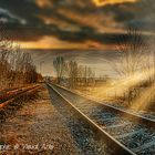 Railways crossing in the colorful lighting sunrise 