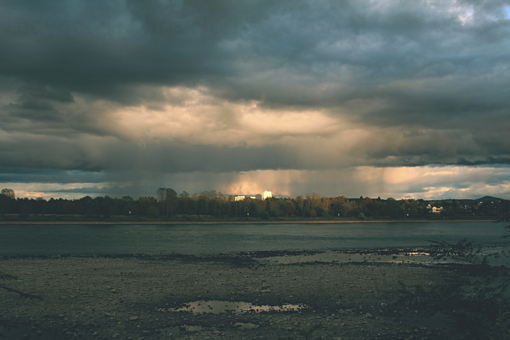 Rain, clouds, river and ...