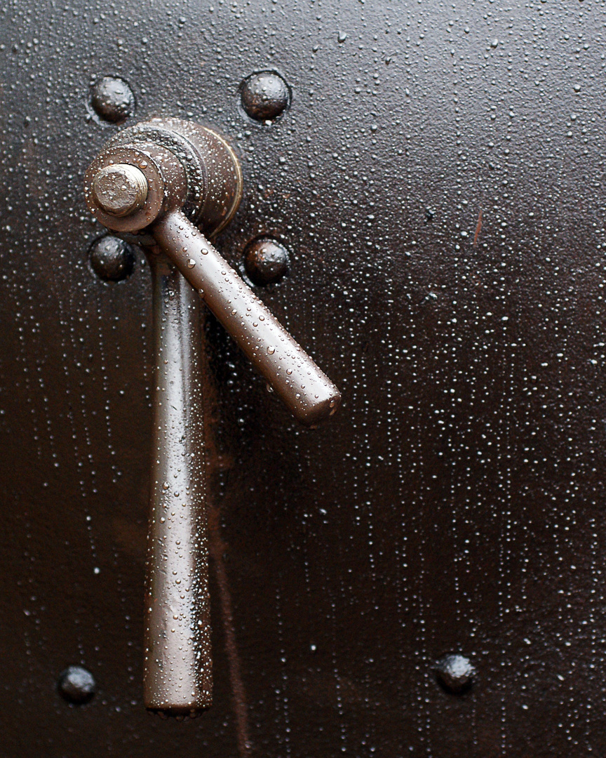 Rain drops on Metal.