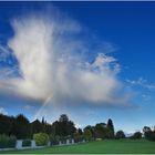 rainbow over cemetery