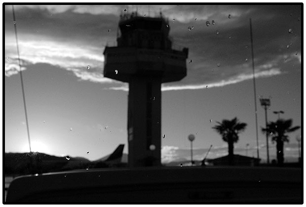 Rainy medterrean airport in sunset