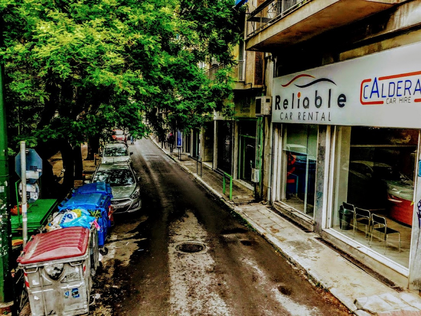 rainy road in athens greece