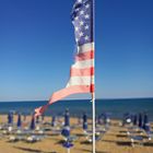 Raising the Flag on the beach  