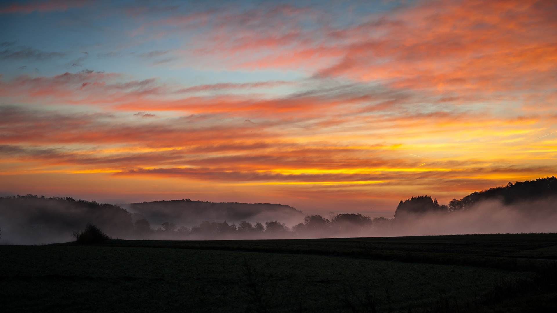 Rauchiger Sonnenaufgang