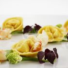 Ravioli di patate con broccolo romano e mazzancolle