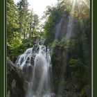 Rayons de lumière à la Grande cascade du Tendon