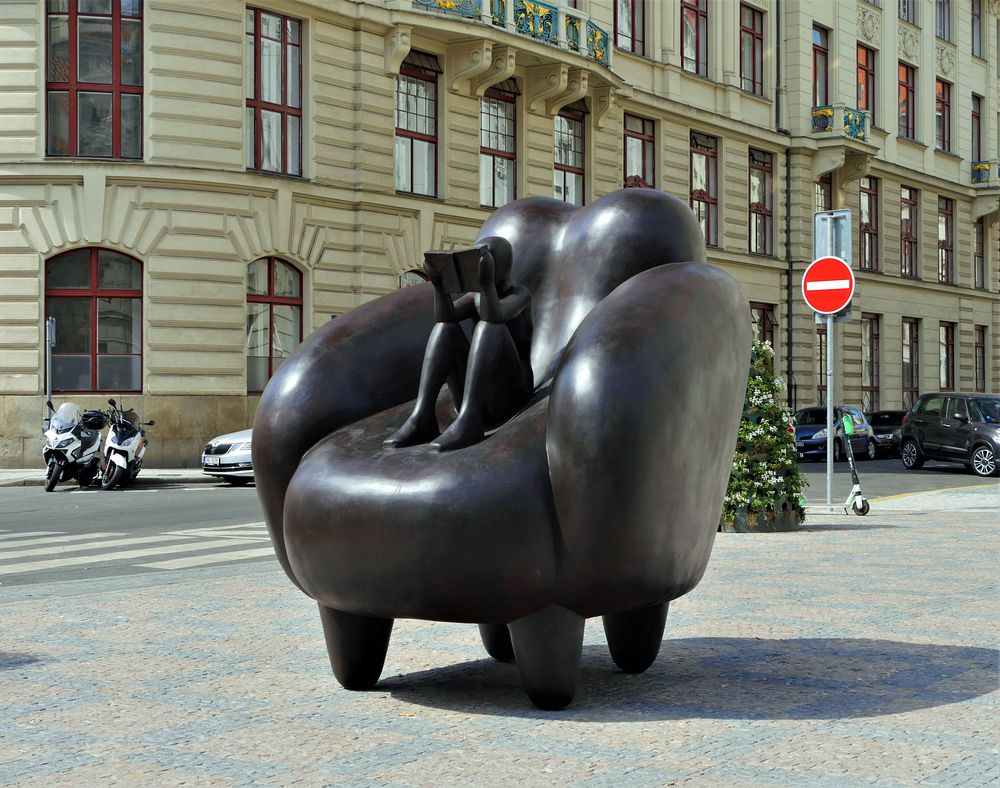 READER IN AN ARMCHAIR