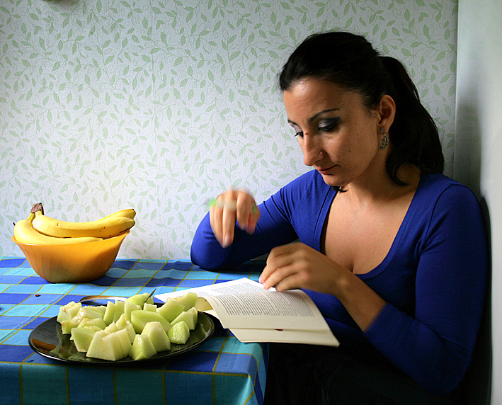 reading a book in the kitchen