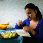 reading a book in the kitchen