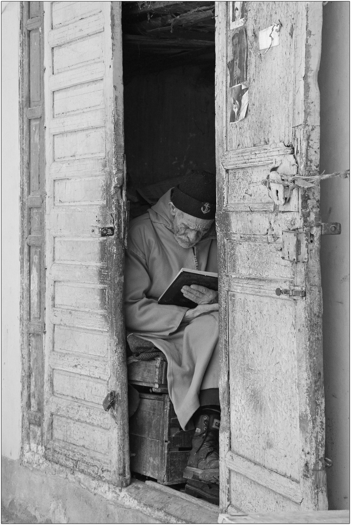 reading a book, meknes