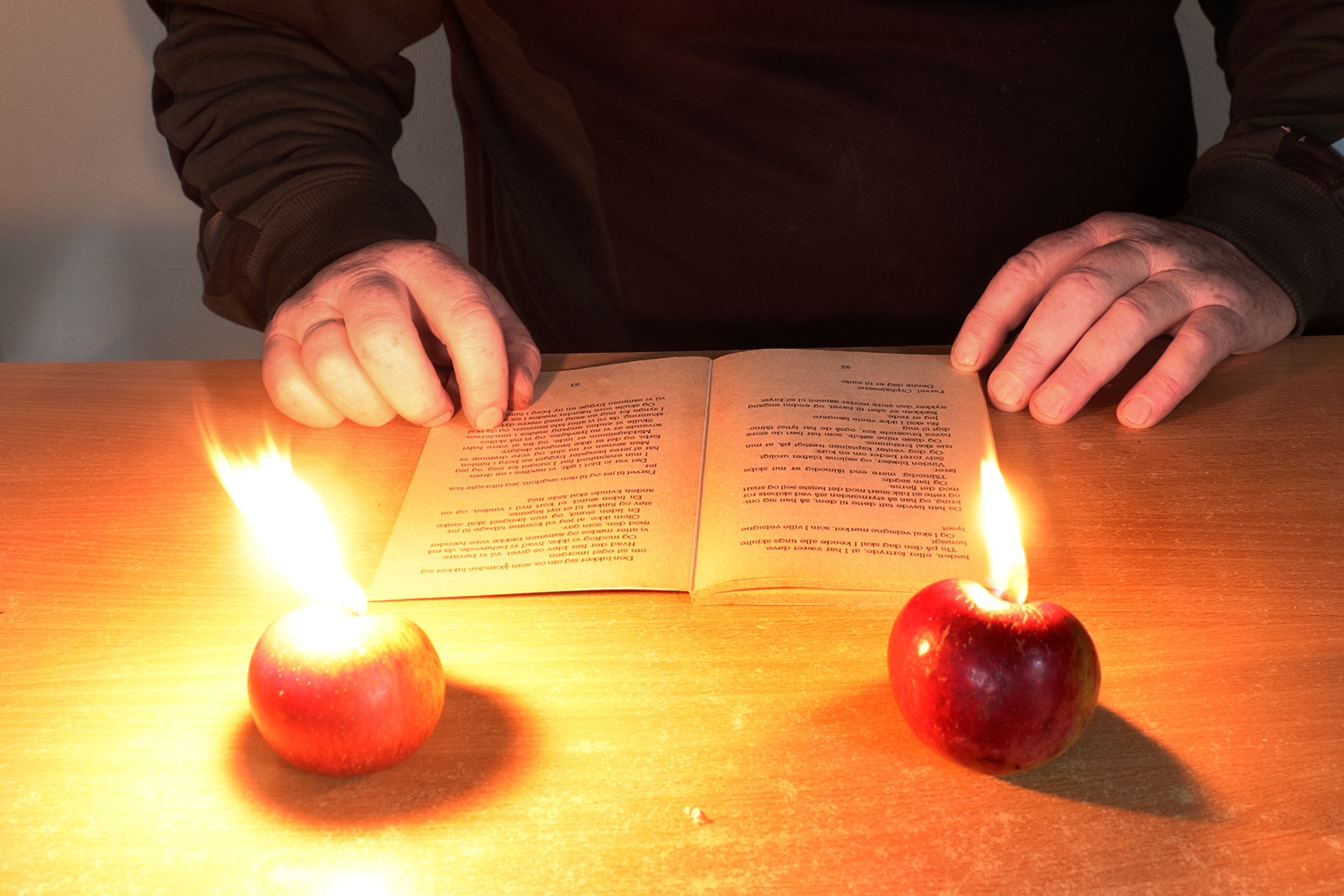 Reading by apple candles
