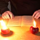 Reading by apple candles