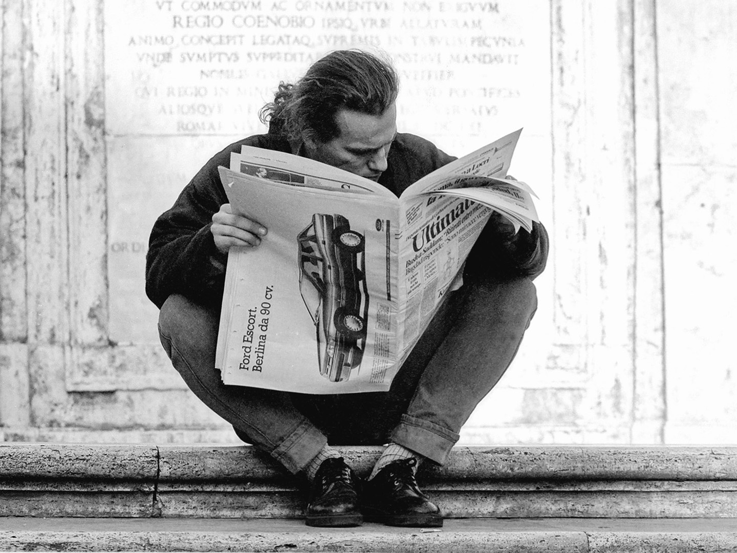 Reading newspaper