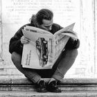 Reading newspaper