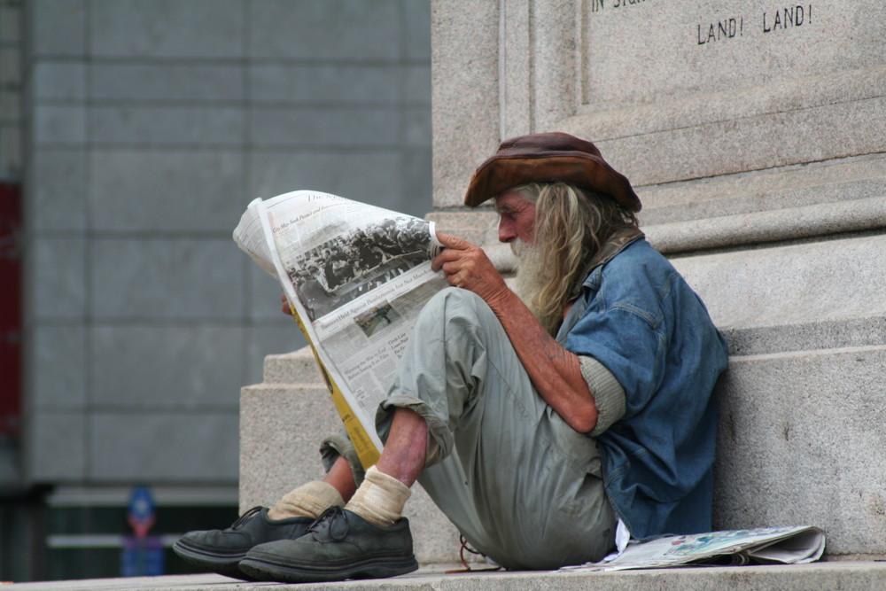 Reading the morning post.