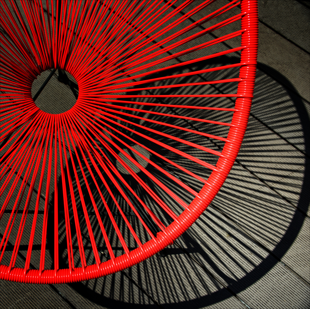 red chair with black shadow