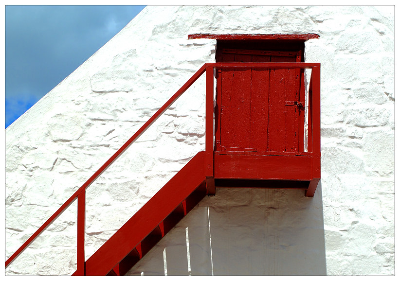 red door - white wall