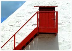 red door - white wall