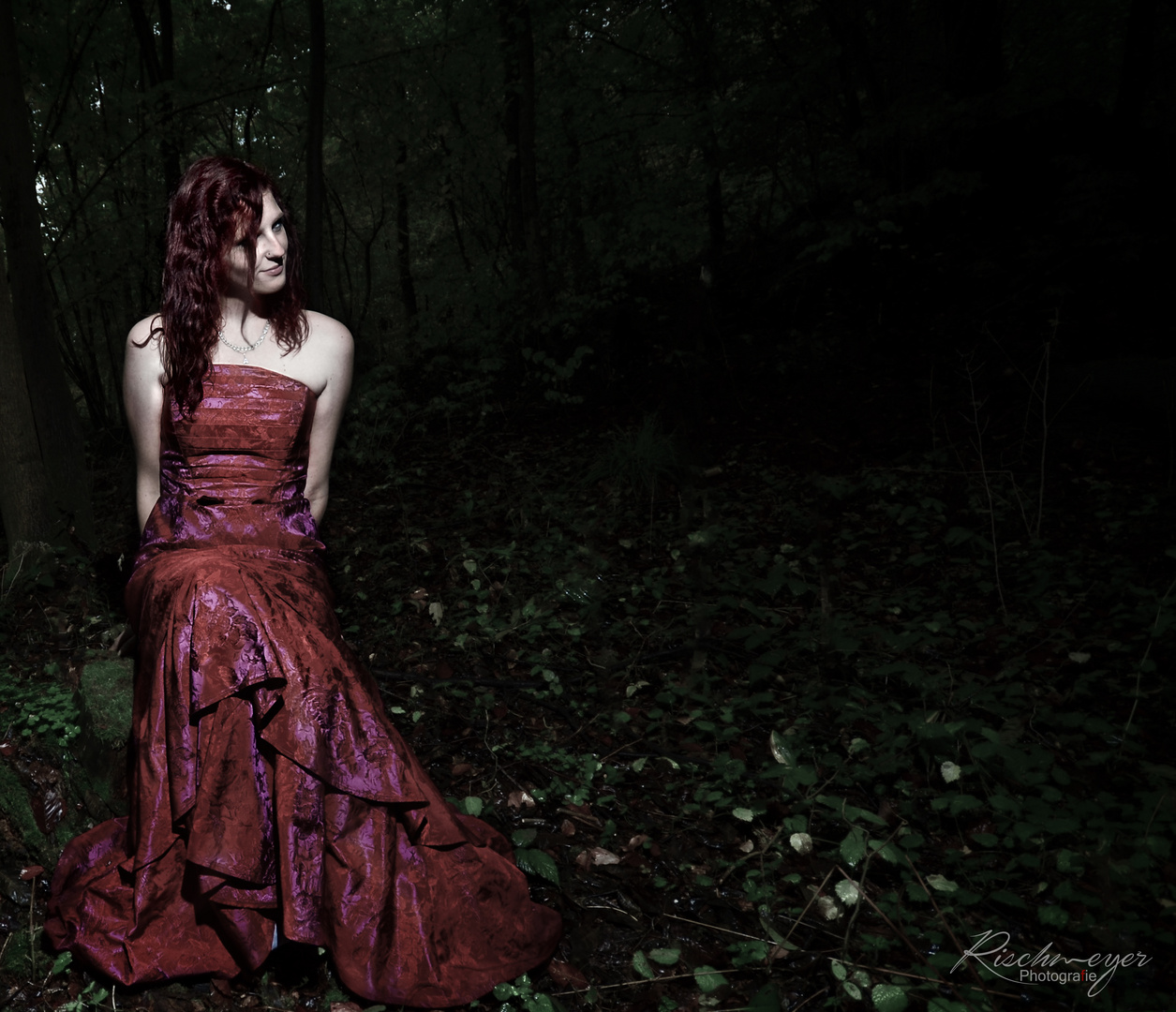 Red dress in the forest