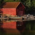 red house with boat