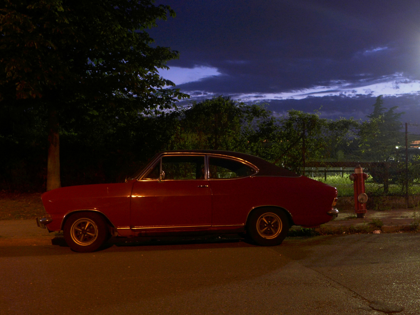 Red Kadett meets red hydrant