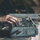 red nails on typewriter